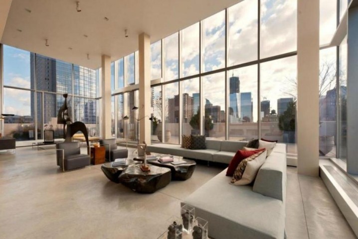 comfort-modern-livingroom-design-ideas-with-glass-wall-with-direct-hight-building-view-945x631