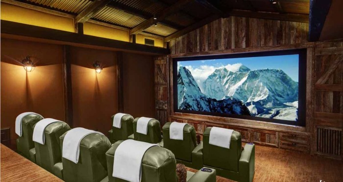 rustic-home-theater-idea-with-green-chairs-for-natural-look-700x373