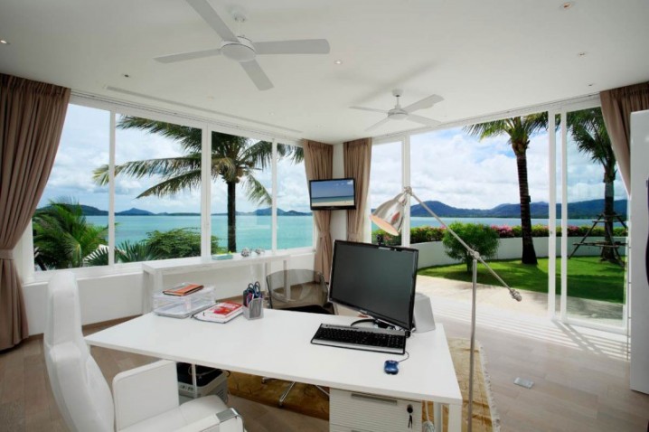 tropical-home-office-design-with-white-desk-and-white-chair-also-open-style-and-lovely-garden