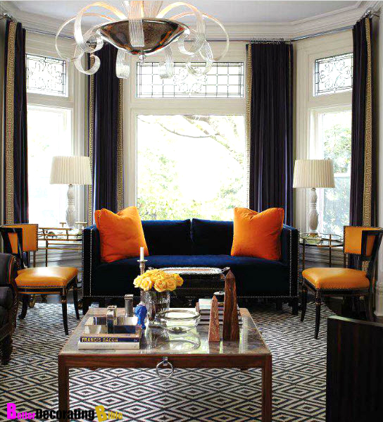 armingtonblackman-Suzy-q-better-decorating-bible-boutique-interior-décor-blog-orange-hue-zebra-spring-easter-design-ideas-print-leather-faux-chair-ottoman-hot-fabrics-ideas-silver-studs-Louis-Vuitton-trunk-her