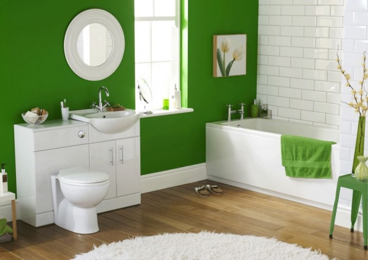 excellent-photo-of-bathroom-tile-ideas-and-green-bathroom-plus-white-bathtub-also-white-toilet-and-vanity-units-plus-white-bath-rugs-with-glass-windows-and-white-subway-tile-wall-and-laminate-flooring-945x668
