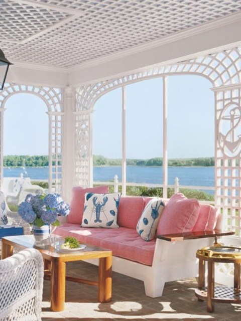 56-Awesome-Pastel-Patio-Design-Ideas-with-white-pink-sofa-pillow-table-blue-flower-decor-table-and-sea-view-with-lamp