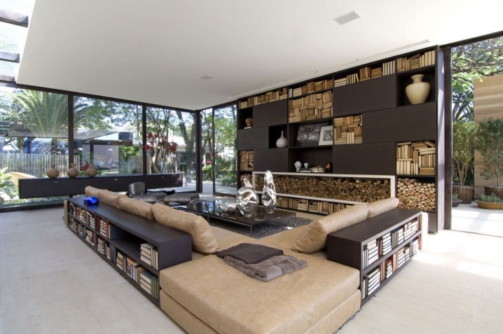 loft-firewood-storage-and-l-shaped-sofa-with-books