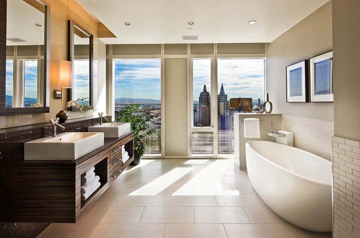 Beautiful-city-views-as-the-perfect-backdrop-for-this-stunning-bathroom-combined-with-white-bathtub-also-wooden-vanity-with-twin-sinks-for-home-spa-trends-on-luxury-bathrooms