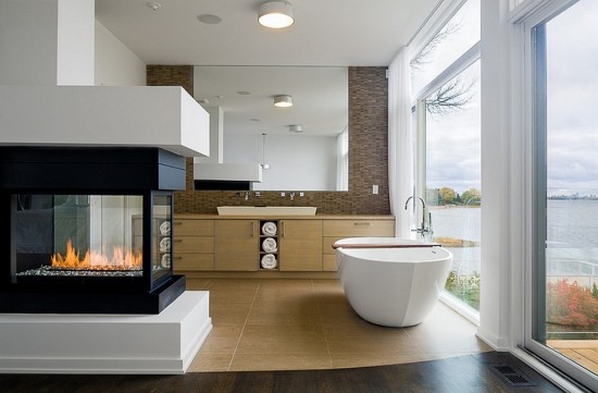 modern-Fireplace-in-the-bathroom-with-stylish-white-bathtub-is-the-hottest-trend-in-interior-design-for-home-spa-trends-on-luxury-bathrooms-550x361