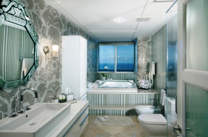 modern-bathroom-design-with-damask-like-wall-pattern-tile-and-interesting-mirror-decor