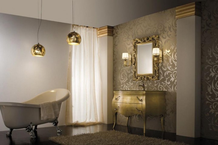 classic-luxury-bathroom-in-gold-color-interior-design-with-pendant-lamps-including-gold-vanity-and-wall-lighting-beside-mirror-and-white-curtain-glass-window