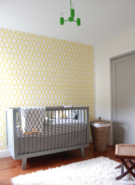 cool-gray-modern-nursery-ideas-for-boys-wooden-lamnate-floor-white-fur-rug-gray-door-motif-yellow-wallpaper