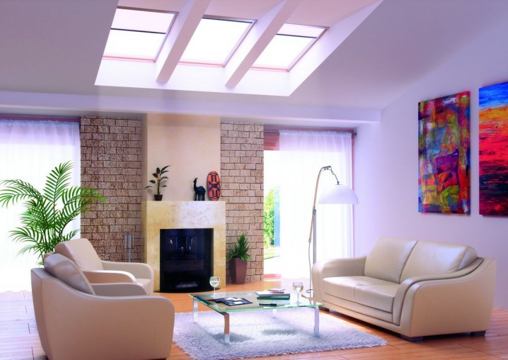 Living-Room-With-Skylight-With-Color-Beige-Sofa-also-Ornamental-Plants-And-Fireplace