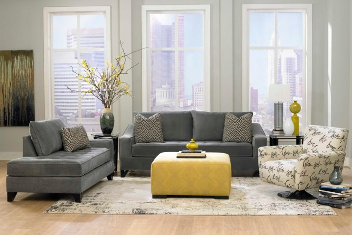 Modern-living-room-design-with-cool-gray-sofas-and-a-small-yellow-table-and-a-simple-white-rug-1024x683