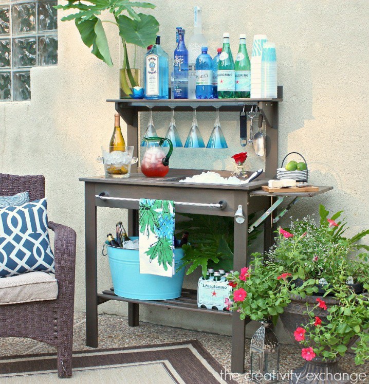 Inexpensive-potting-bench-turned-into-an-outdoor-bar-and-beverage-station-for-entertaining.-The-Creativity-Exchange