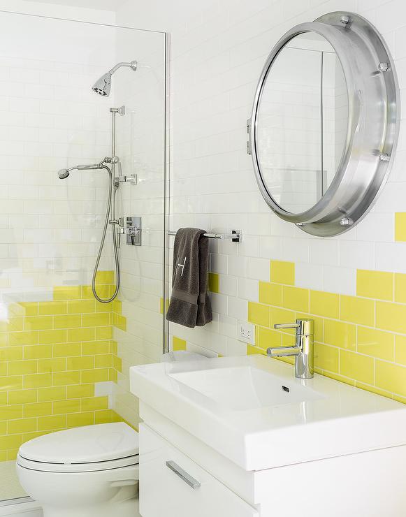 kids-bathroom-yellow-subway-tiles-porthole-mirrored-medicine-cabinet-