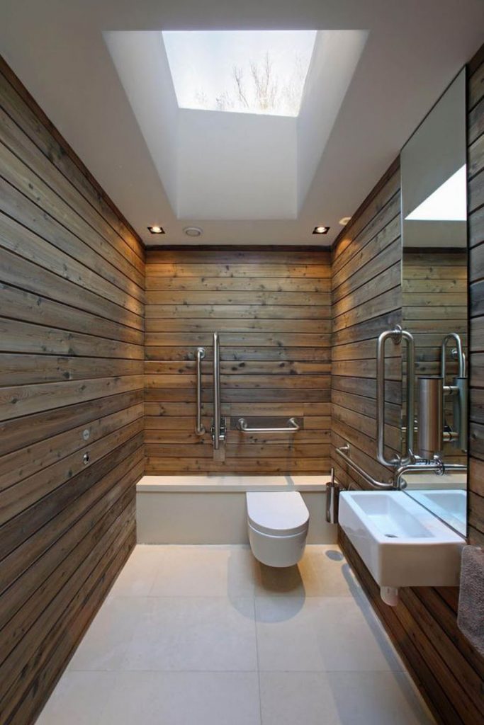 Modern-minimalist-airy-bathroom-with-stained-wood-plank-wall-panel-square-skylight-window-interior-design-ideas-simple-modern-bathroom-design-ideas