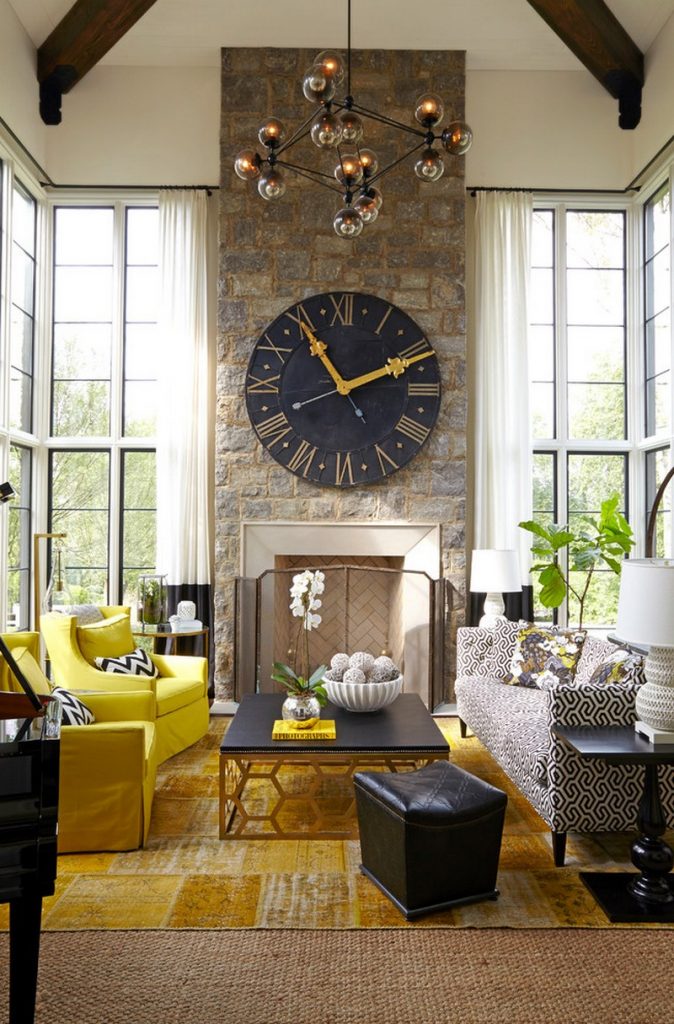 Astounding-living-room-with-vintage-sofa-set-and-yellow-wing-back-armchairs-also-built-in-fireplace-in-stone-wall-decorated-by-bigwall-clock-and-stylish-hanging-lamp