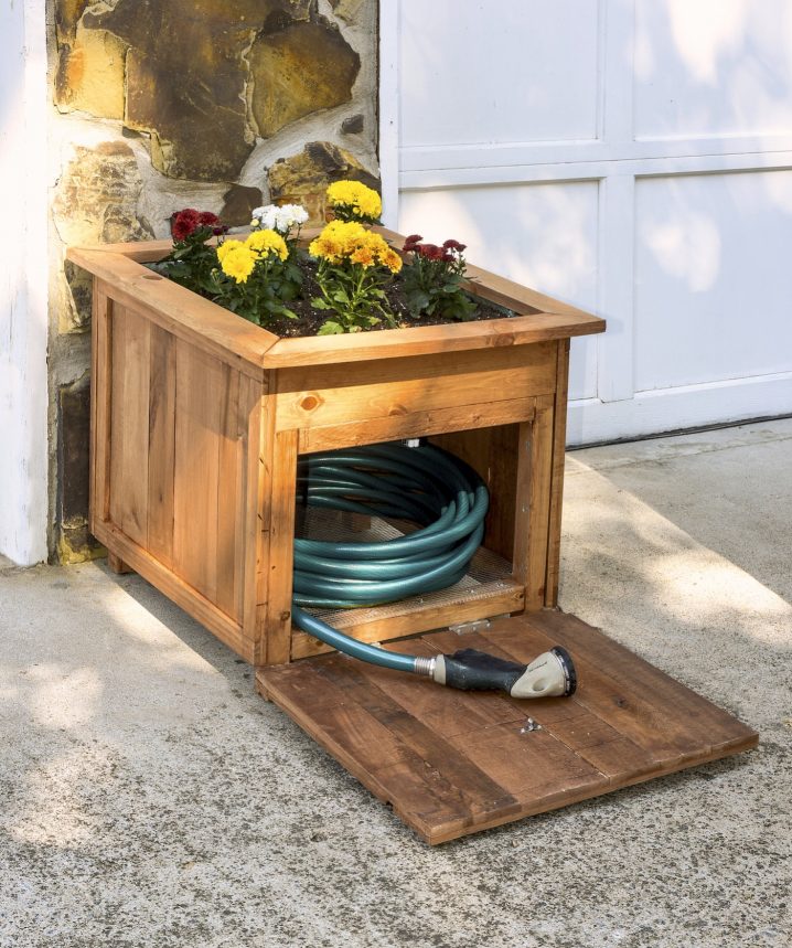 Wood-hose-caddy-with-planter-open-e1