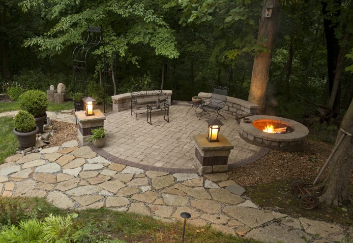 outdoor-patios-home-ideas-circle-stone-floor-ideas-with-black-iron-chair-and-circle-fire-space-beautiful-patios-garden-architecture-beautiful-patios