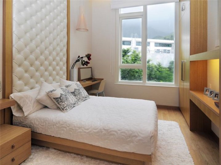 tall-tufted-headboard-idea-in-luxurious-small-bedroom-design-also-stylish-window-and-white-fur-area-rug
