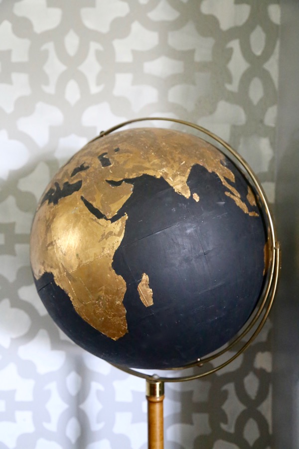 DIY-Gold-leafing-on-a-repurposed-globe-by-Love-and-Renovations-featured-on-@Remodelaholic