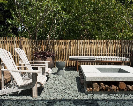 bamboo-garden-fence-gravel-path-sun-chair