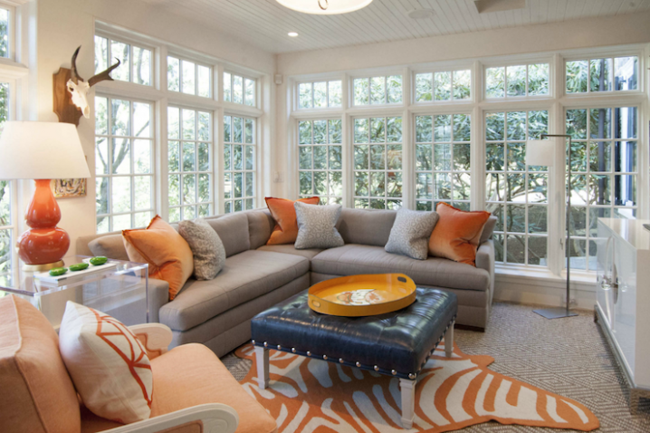 gray-and-orange-living-room-navy-leather-ottoman-orange-zebra-rug