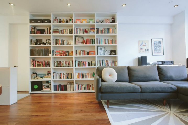 ikea-billy-bookcase-in-contemporary-living-room-with-white-walls-and-medium-tone-hardwood-floors