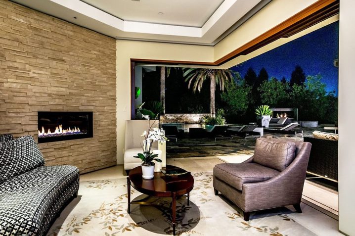 mid-century-modern-fireplace-living-room-contemporary-with-curved-wall-curved-wall-stacked-stone-fireplace