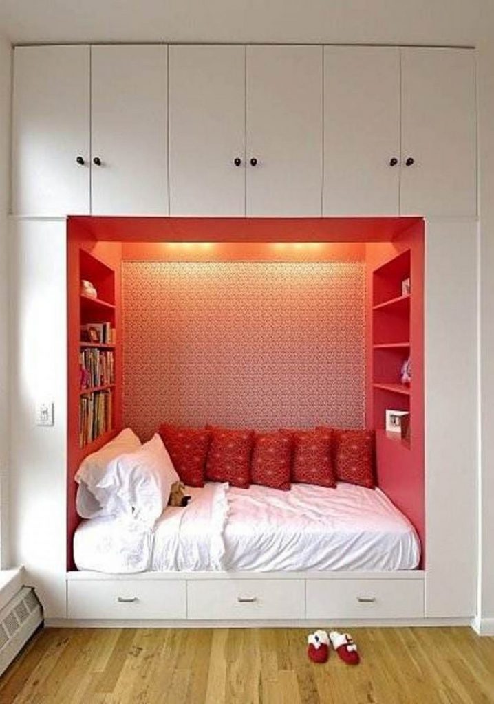 appealing-storage-ideas-for-bedroom-design-with-creative-space-saving-bed-along-white-cabinets-designed-around-chic-bedding-set-red-wall-shelves-well-interior-plu-hard-headed
