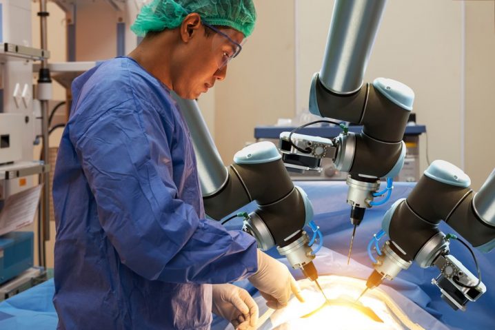 ai robot hands assisting doctor in operating room